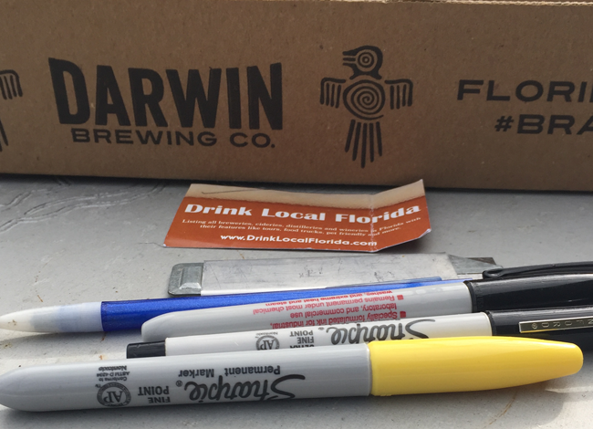Materials for upcycling beer box to toy car parking garage